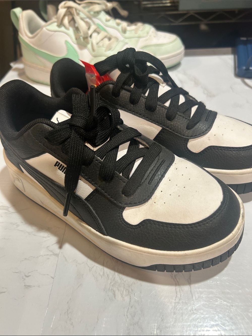 Puma Black & Cream Low-Top Sneakers
